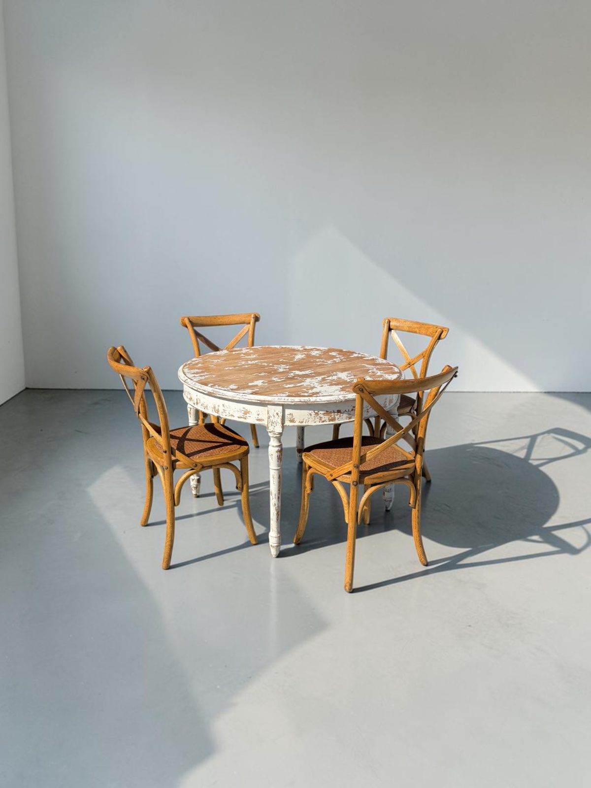 Block & Chisel Round Distressed Dining Table & 4 Cross-Back Chairs