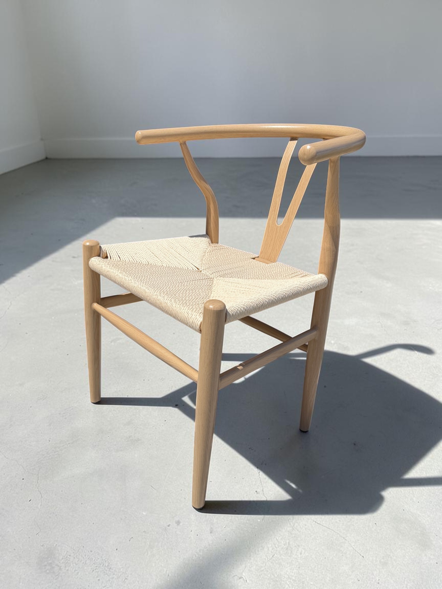 7 Wishbone and reed dining chairs